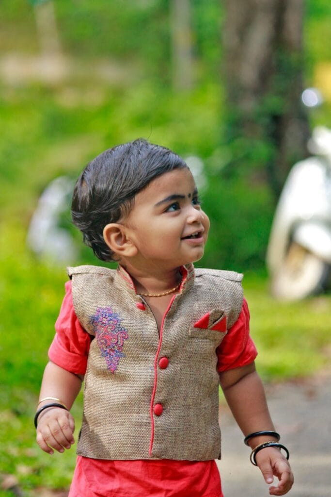 child wearing traditional suit